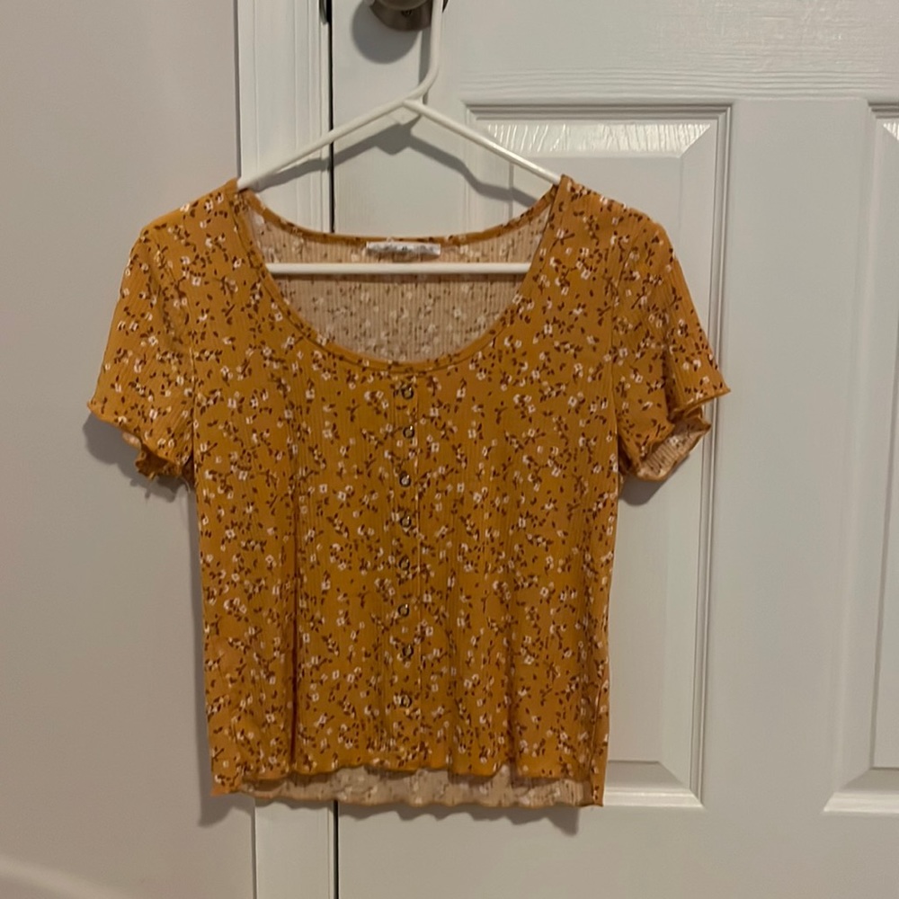 yellowish orange Hippie Rose top with flowers